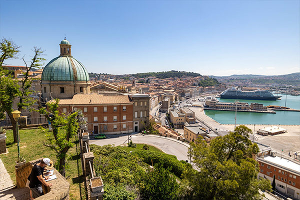 Azamara cruise ship docked in a charming European port