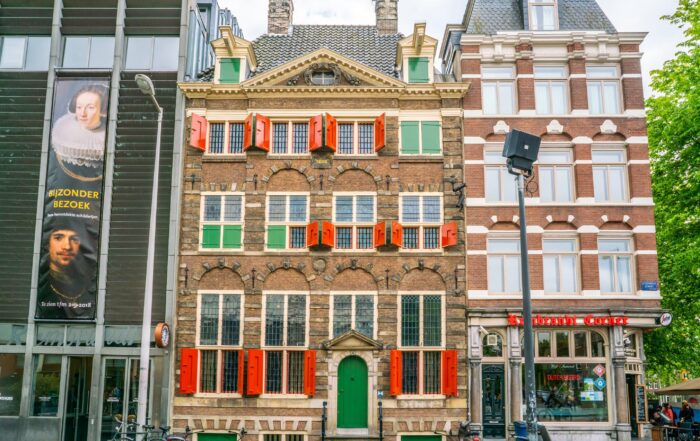 Historic Amsterdam building with classic Dutch architecture near the Rembrandt House Museum in the Netherlands.