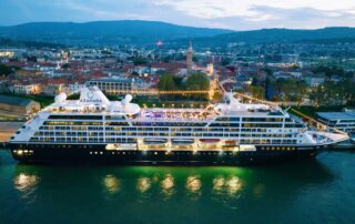 An aerial twilight view of the Azamara Quest cruise ship docked at the Port of Koper, Slovenia