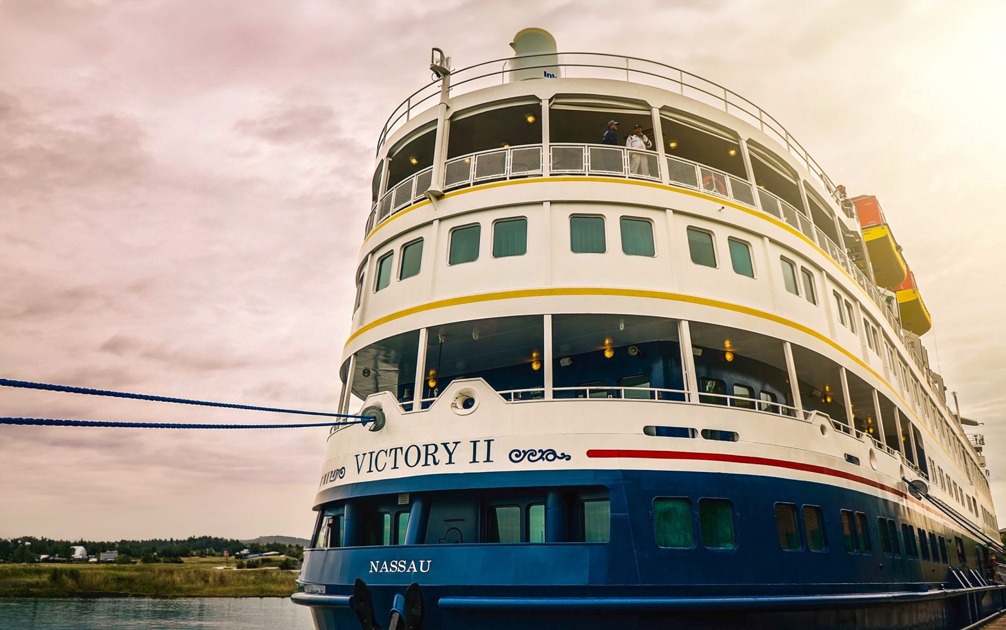 The Victory II, a multi-deck cruise ship operated by Victory Cruises, is docked at Nassau