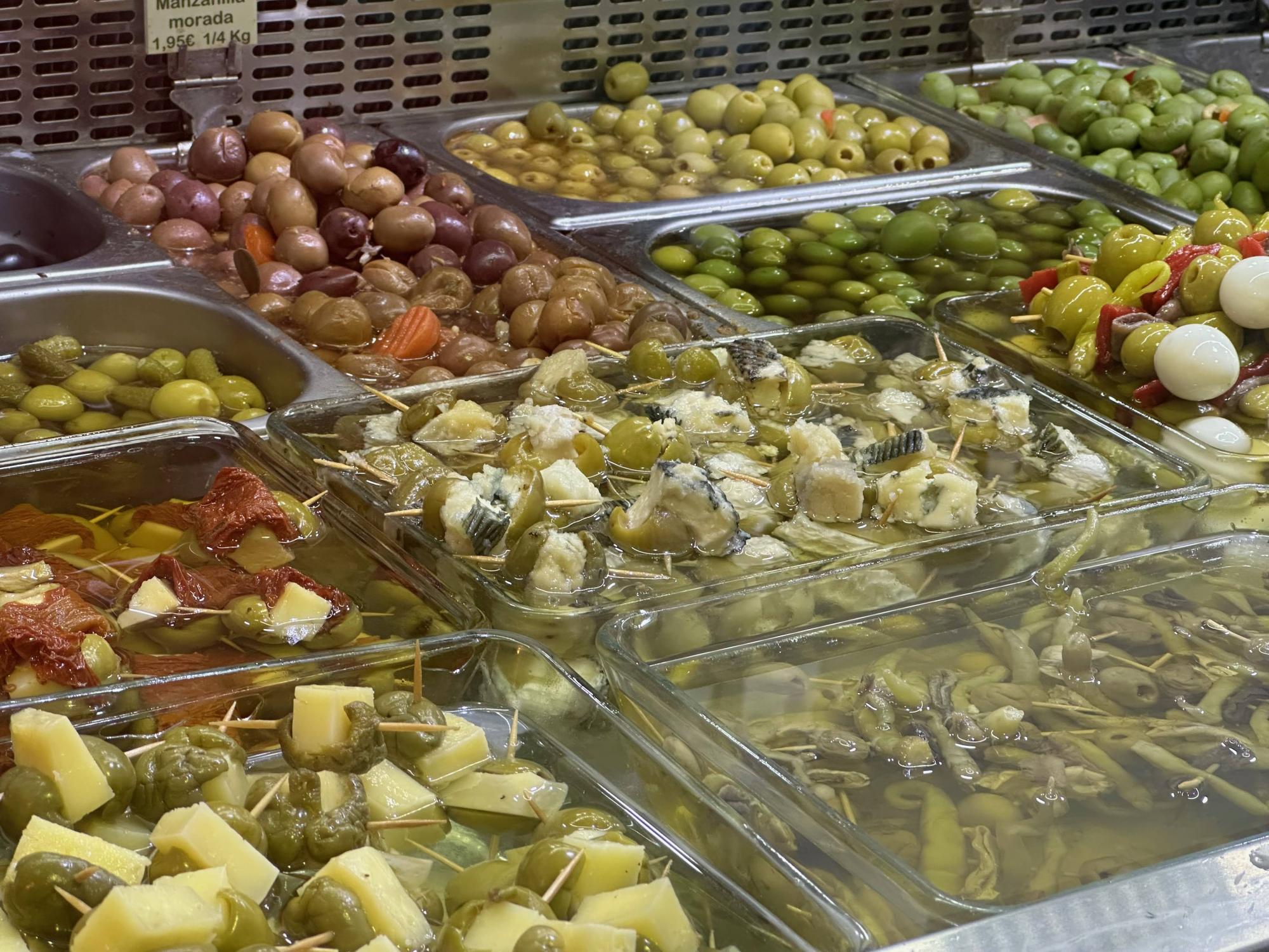 Mediterranean olive and marinated vegetable delicatessen counter display