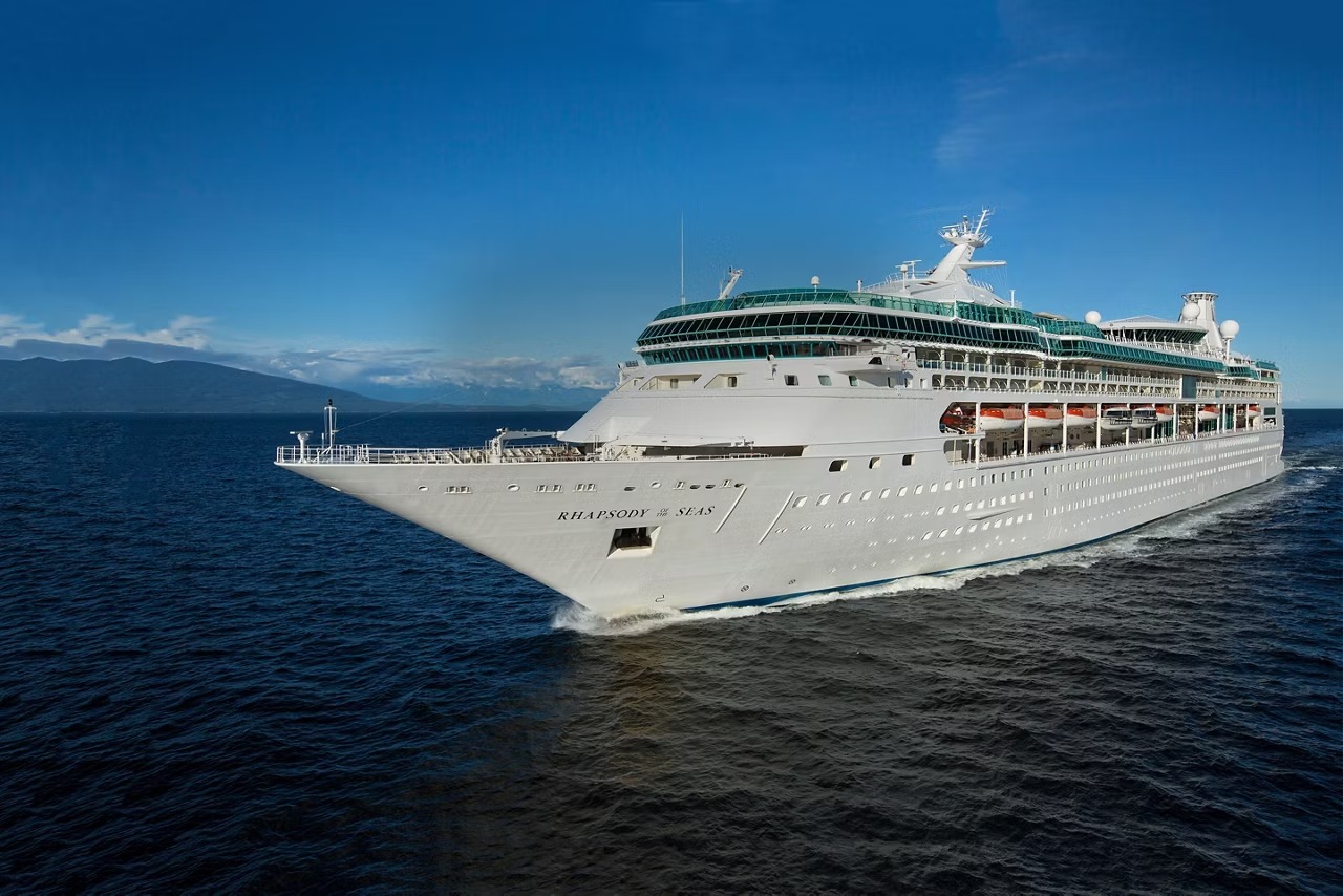 Rhapsody of the Seas Cruise Ship at Sea Rhapsody of the Seas cruise ship sailing through open ocean waters under clear blue sky