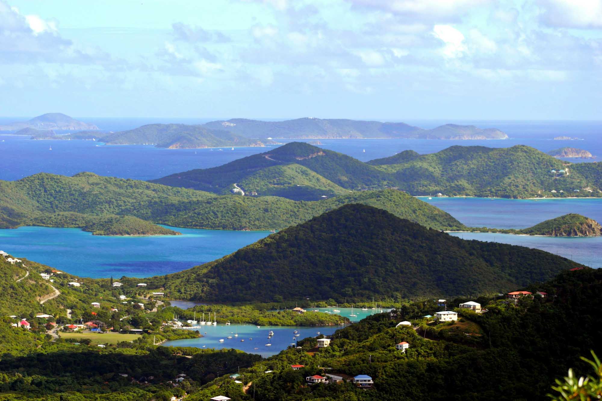 Aerial view of lush tropical islands with protected harbors in the US Virgin Islands