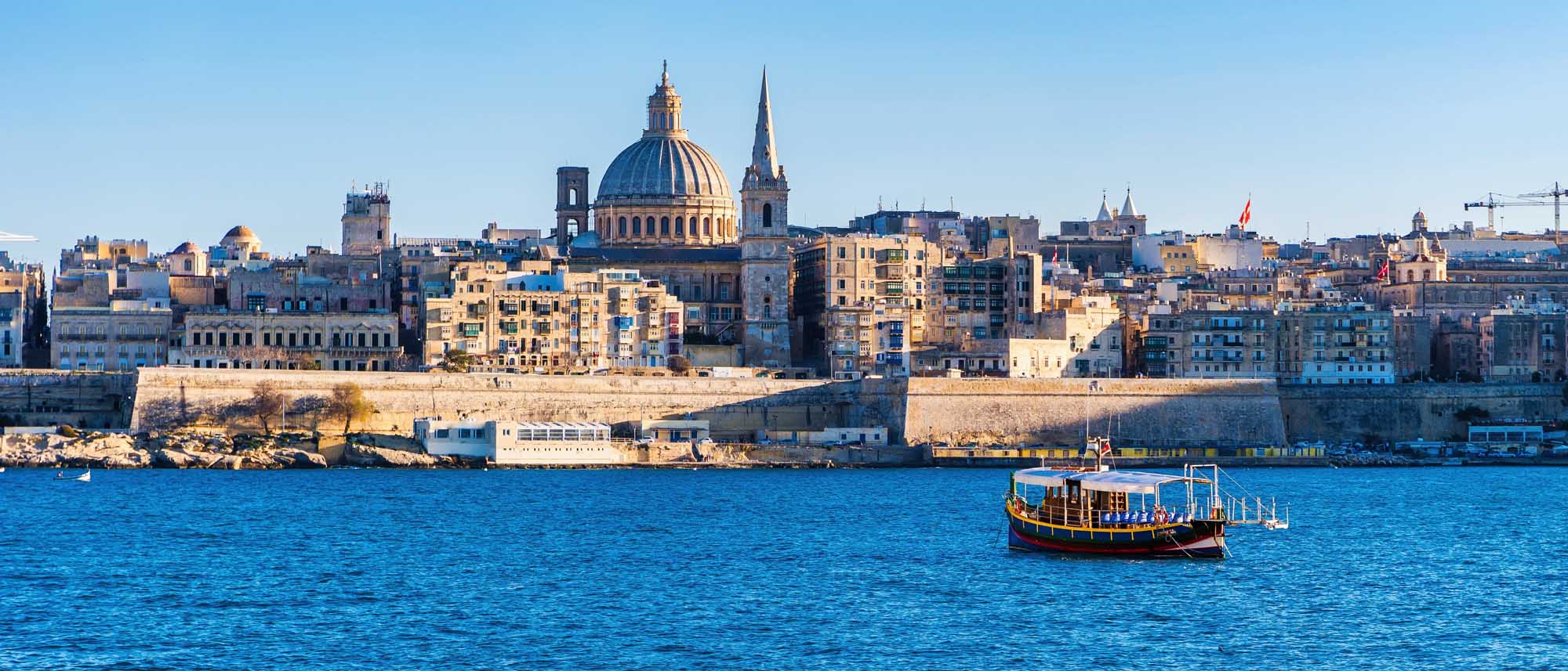 A stunning view of Valletta, Malta's capital, featuring the iconic St. Paul's Cathedral with its