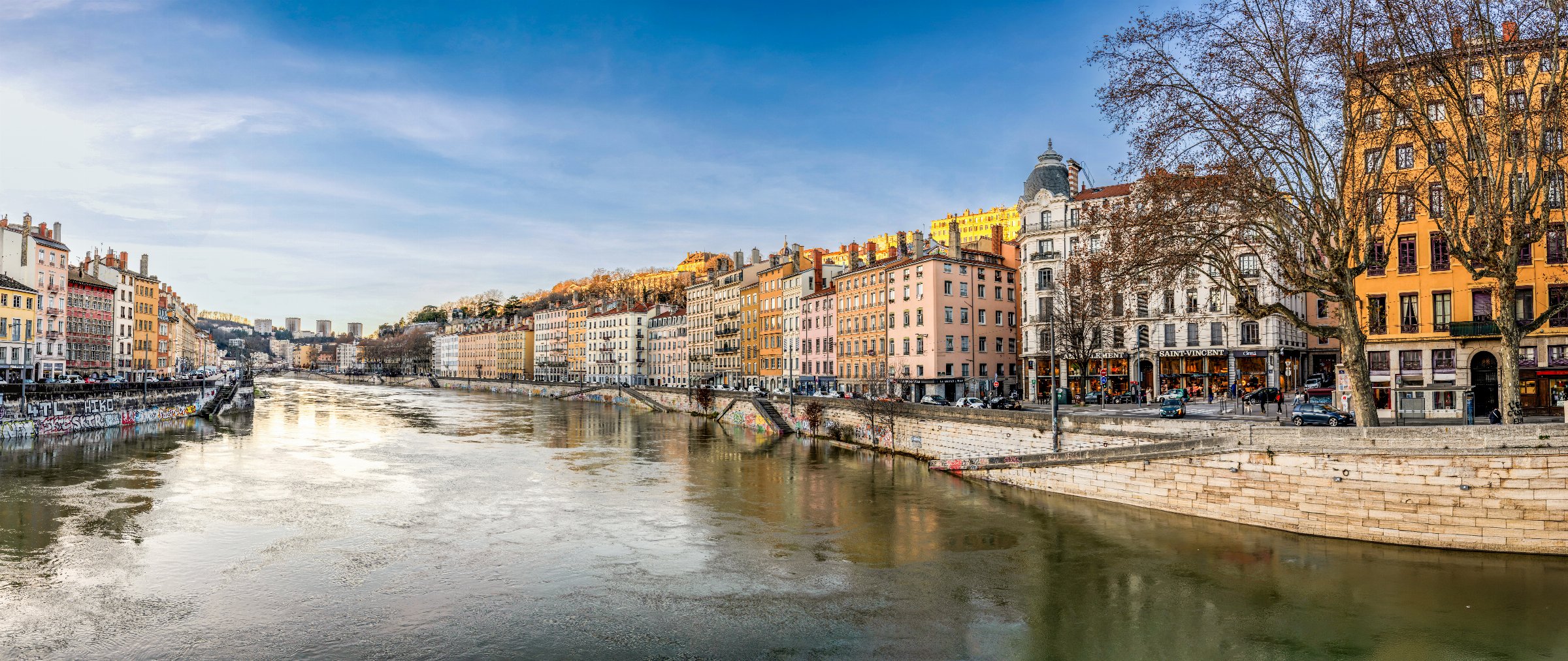 Pastel riverfront buildings along the Saône in Lyon