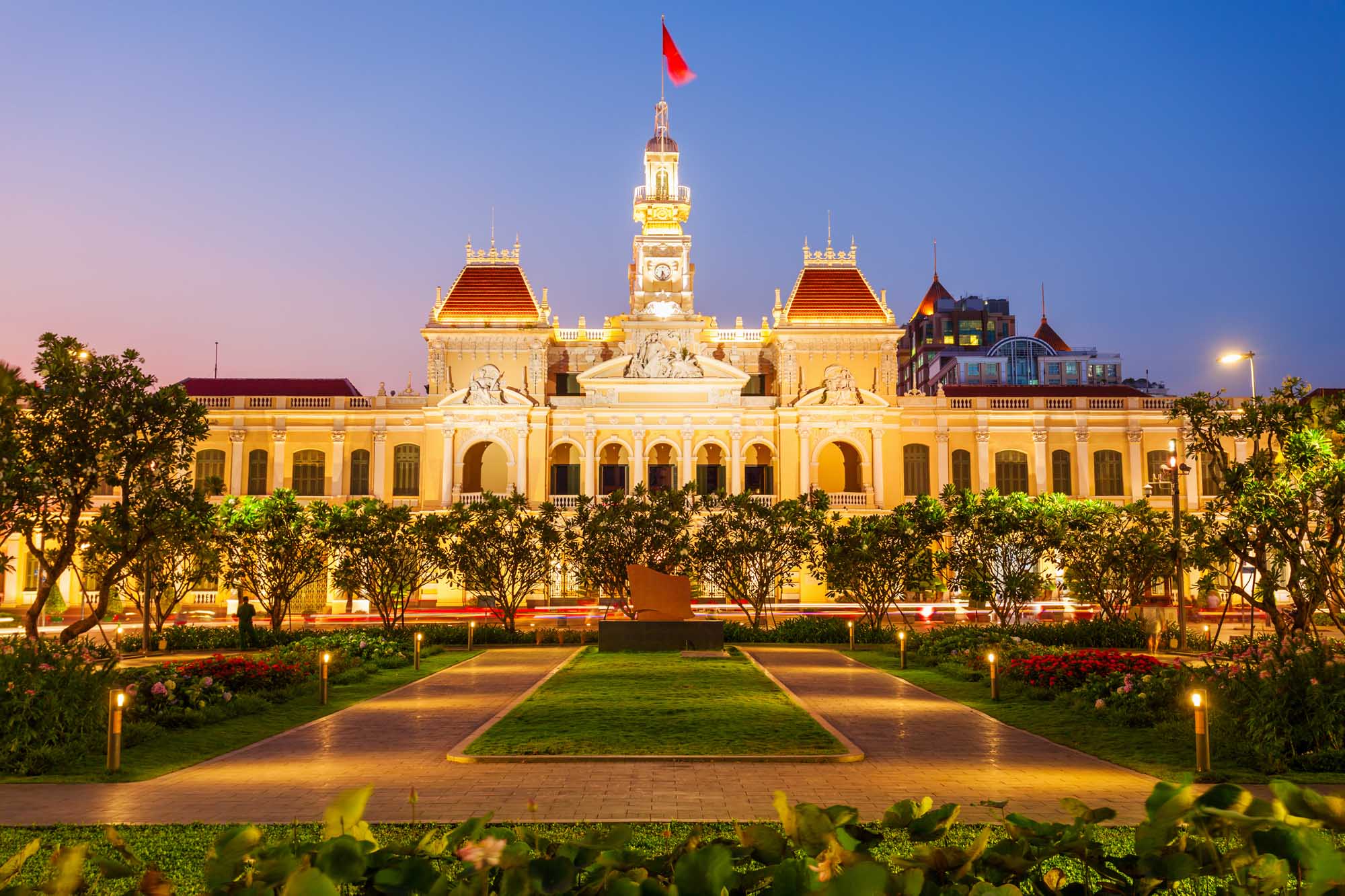 Ho Chi Minh City Hall at Twilight A stunning view of Ho Chi Minh City Hall (Saigon City Hall) illuminated at dusk, showcasing French