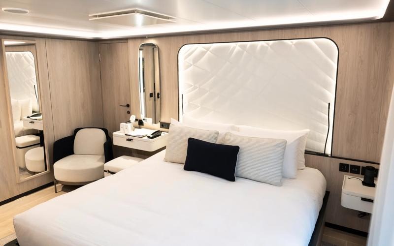 An elegantly appointed luxury cabin aboard Ponant's Le Ponant expedition cruise ship, featuring