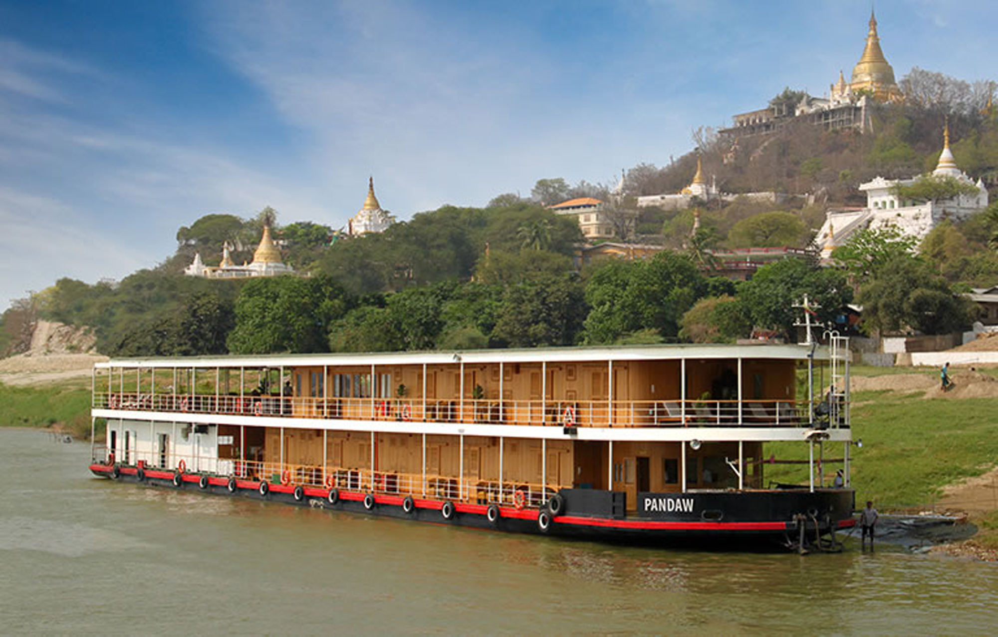 RV Pandaw River Cruise Ship on the Irrawaddy A two-deck river cruise vessel named Pandaw moored on the Irrawaddy River in Myanmar, with golden
