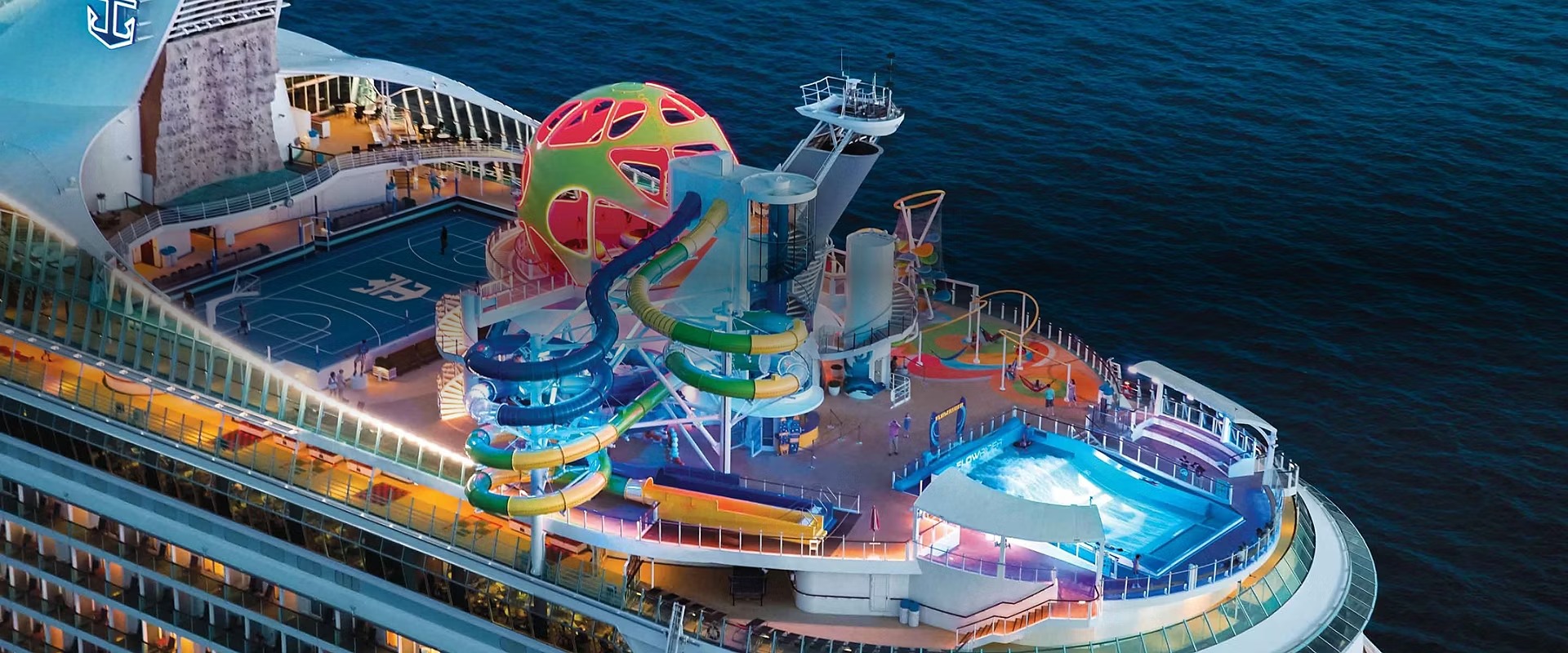 Royal Caribbean Mariner of the Seas Night Lights An aerial view of Royal Caribbean's Mariner of the Seas cruise ship at night, showcasing