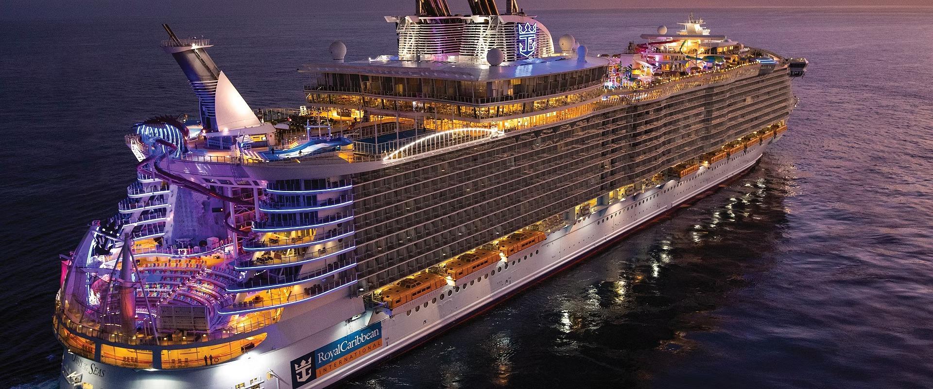 Royal Caribbean Oasis of the Seas at Evening An aerial twilight view of the Royal Caribbean cruise ship Oasis of the Seas illuminated against