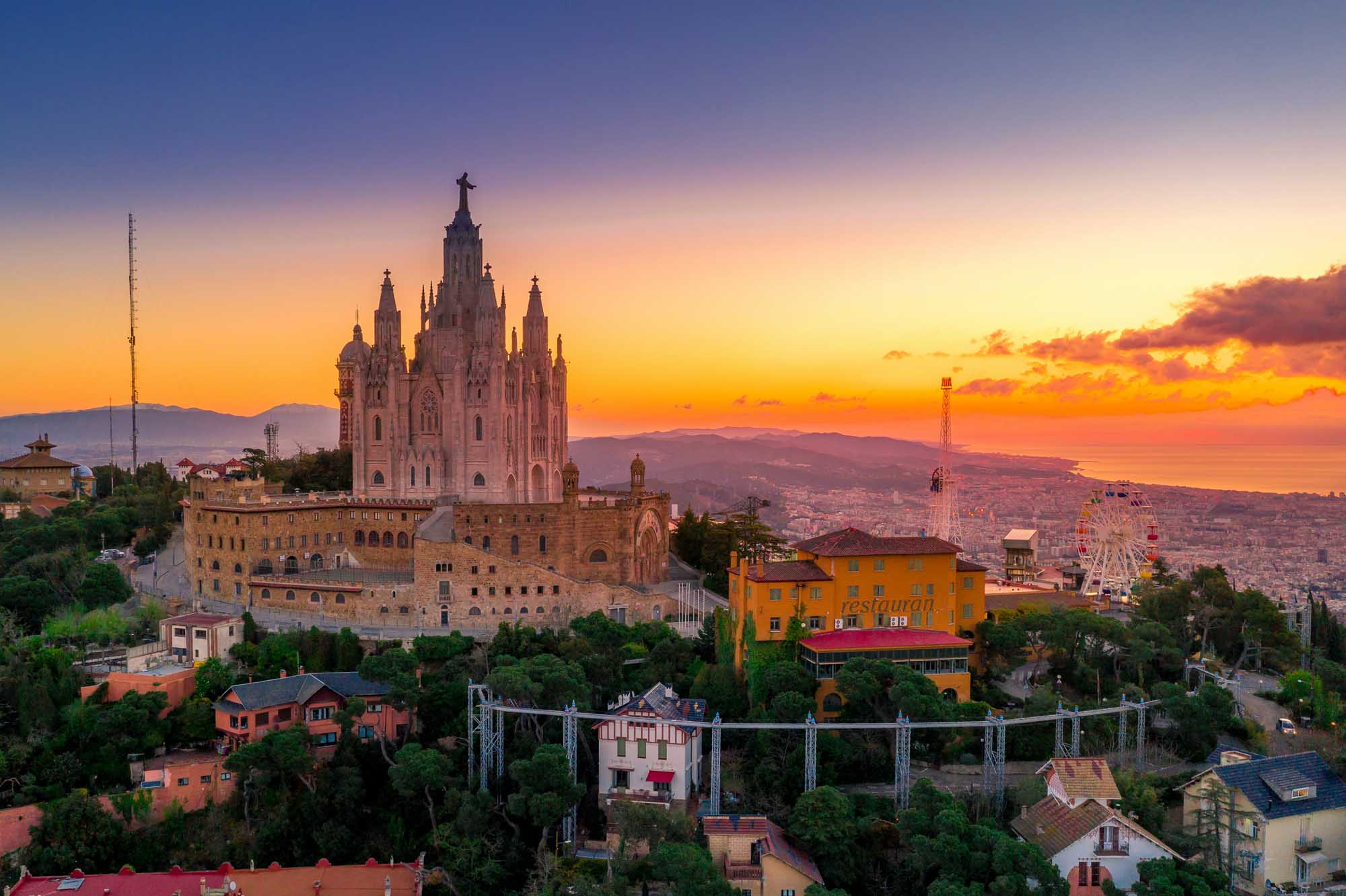 A stunning sunset view of the Templo Expiatorio del Sagrado Corazón (Temple of the Sacred Heart